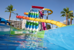 The 50-foot slide tower features three water slides.
