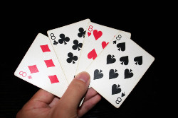 The first player who discards all of his cards in Crazy Eights wins the game.